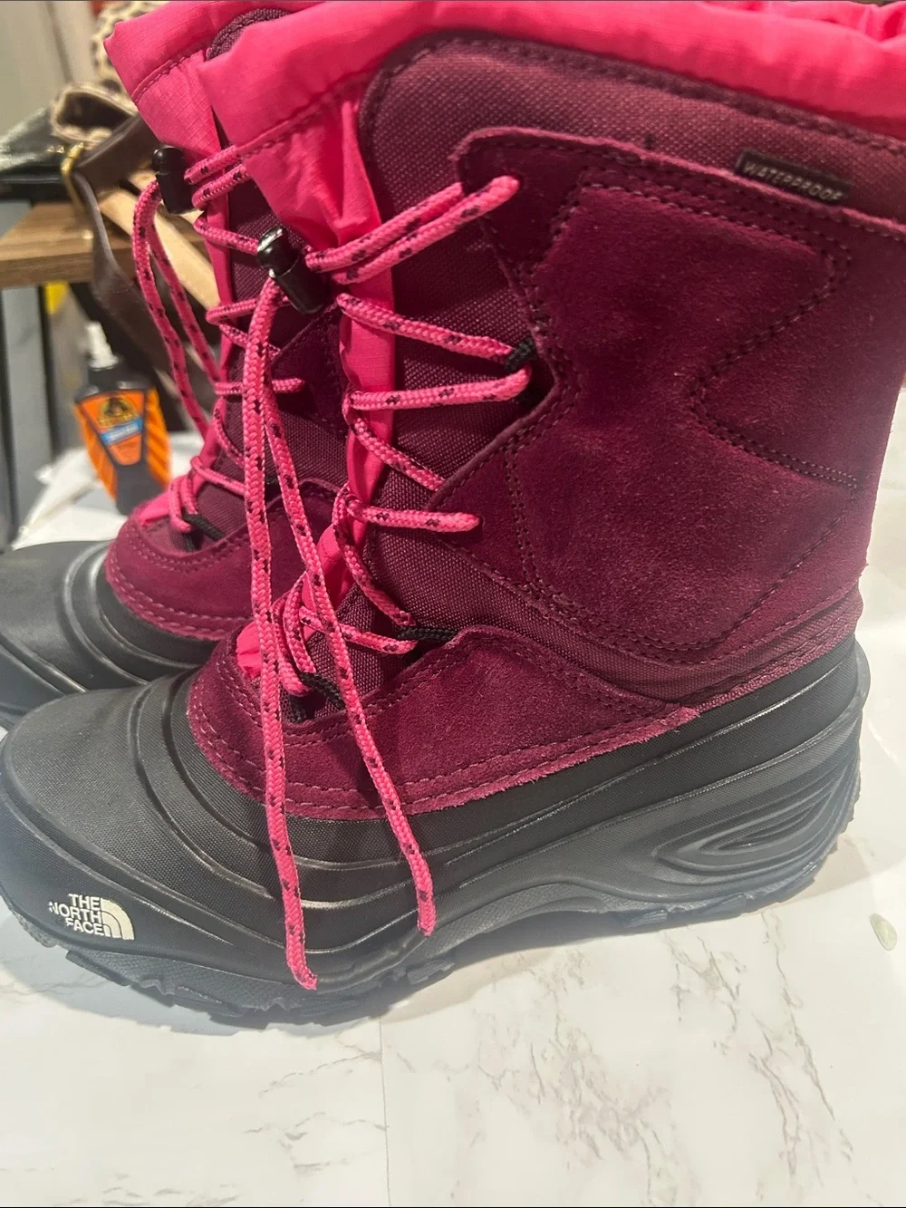 The North Face Kids Waterproof Snow Boots in Burgundy and Pink